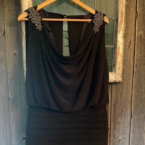Black dress with brocade detail on shoulders